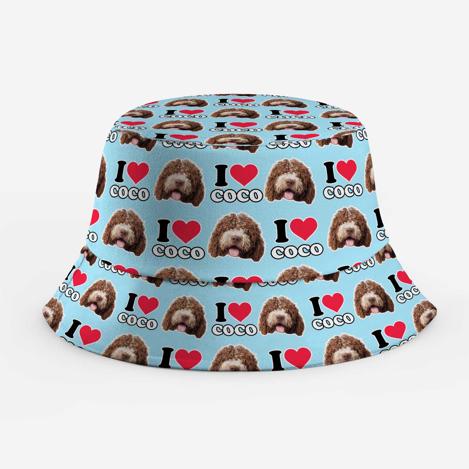 Bucket hat with 'I love Coco' text and dog pattern on a light blue background