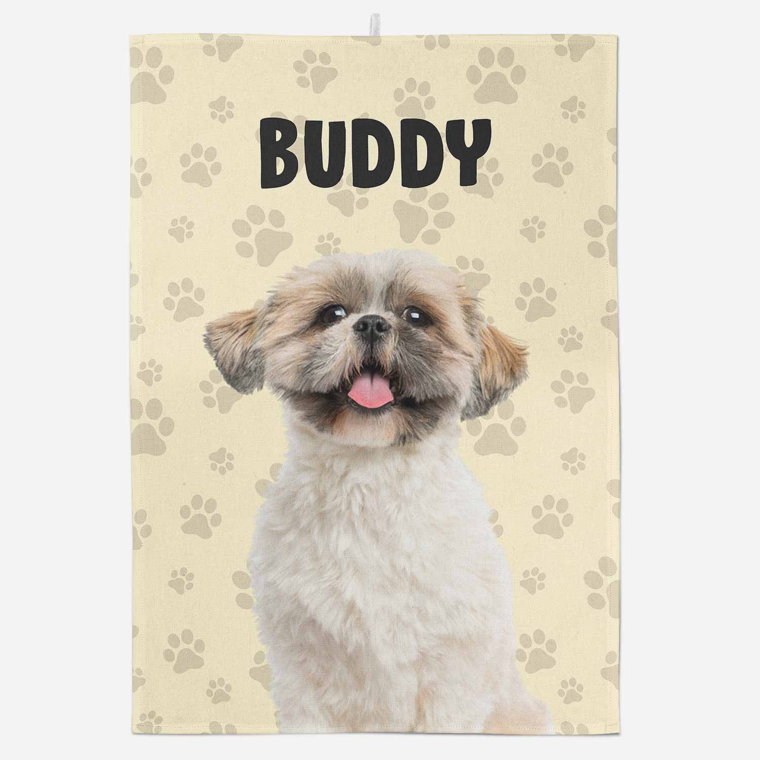 Dog with 'Buddy' text on a beige background with paw prints