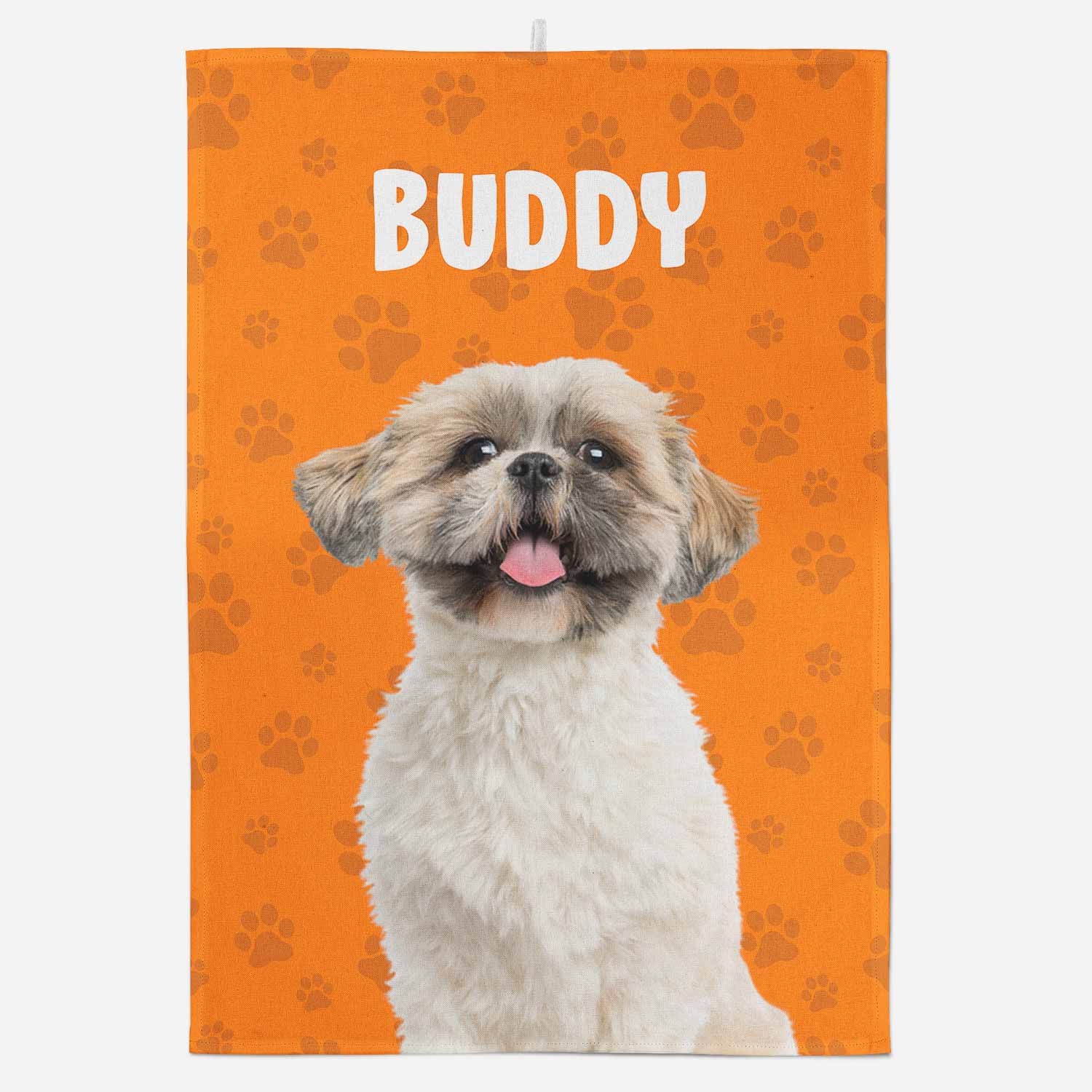 Dog towel with a dog's face and 'Buddy' text on an orange background with paw prints