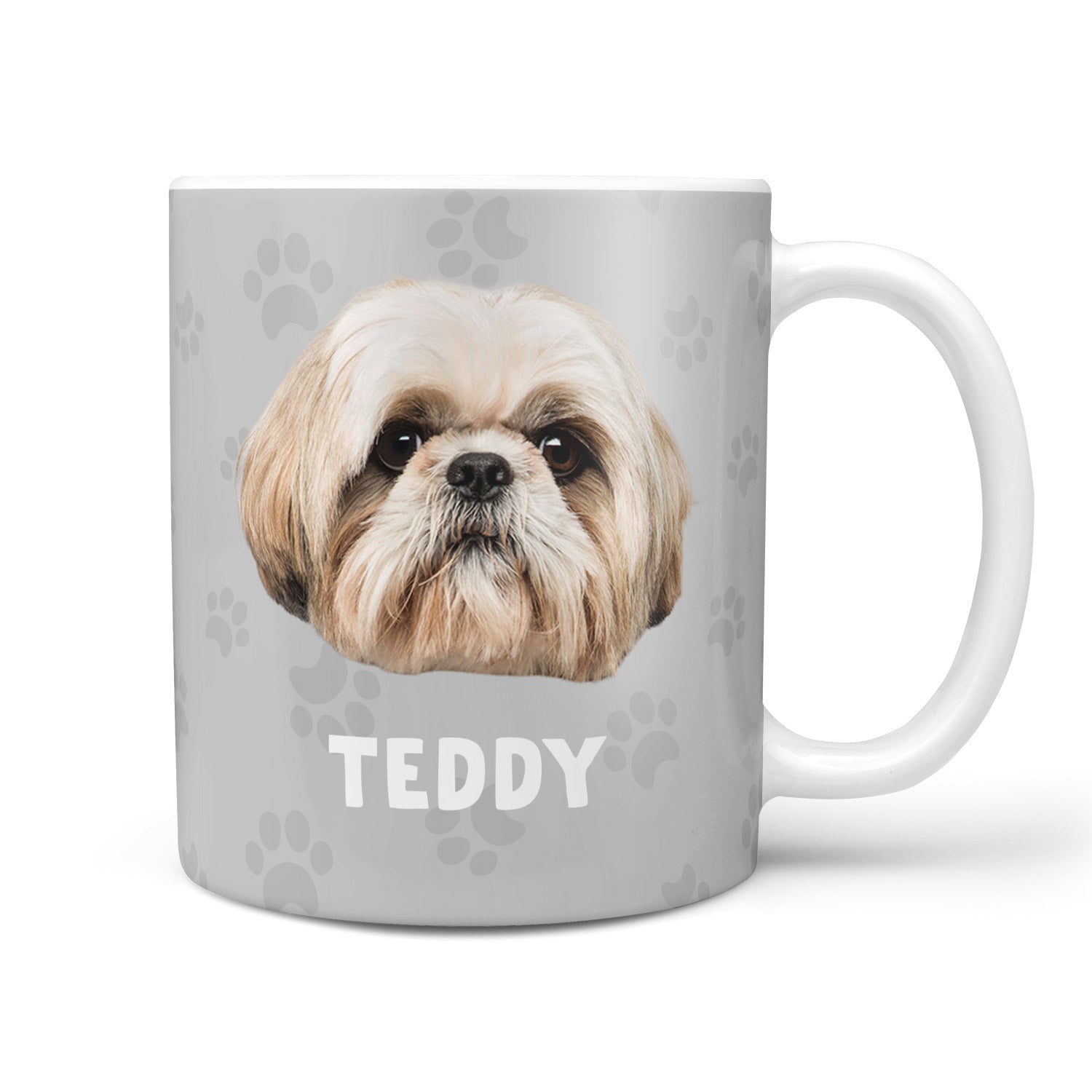 Mug with a dog's face and name 'Teddy' on a gray background