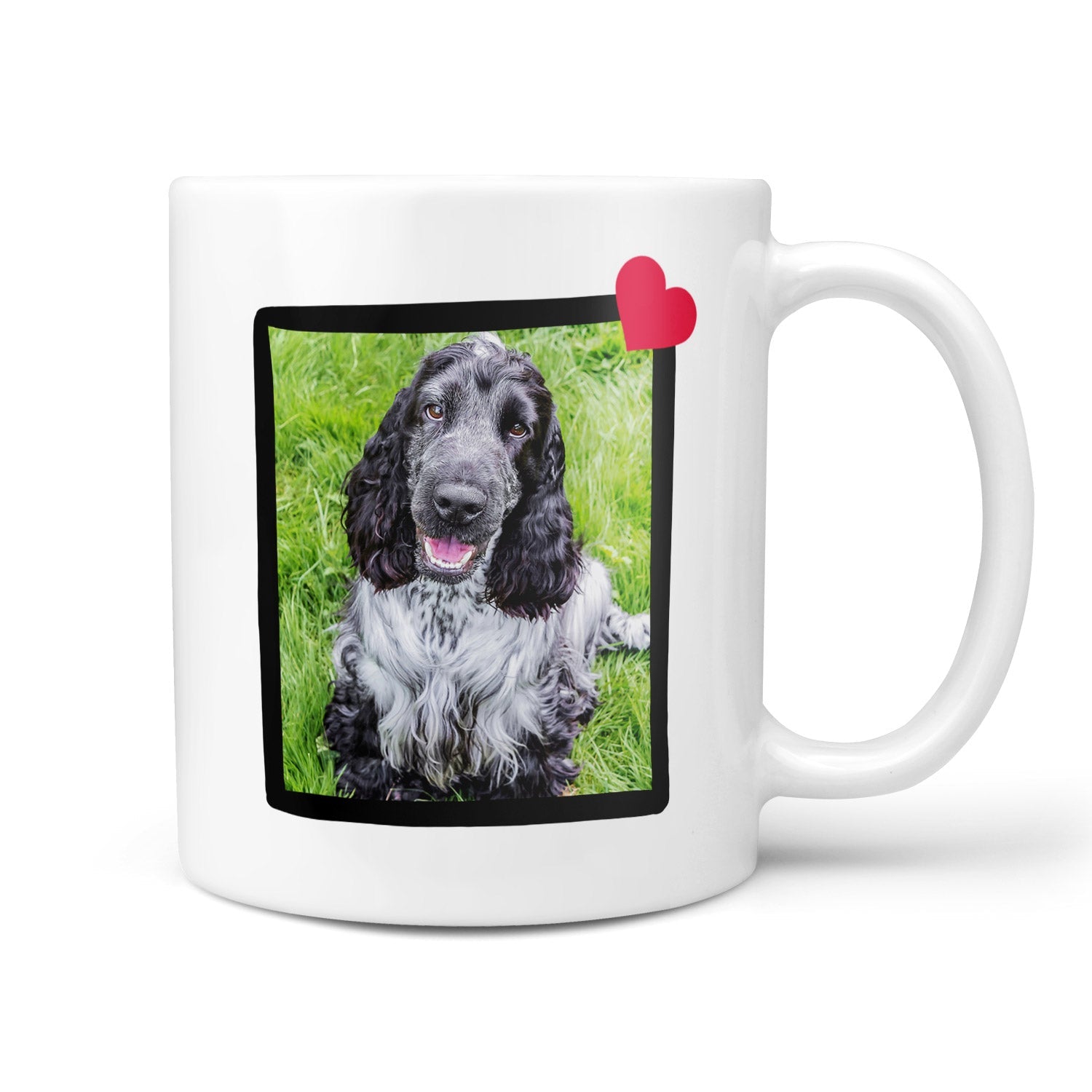 White mug with a photo of a dog on a grassy background