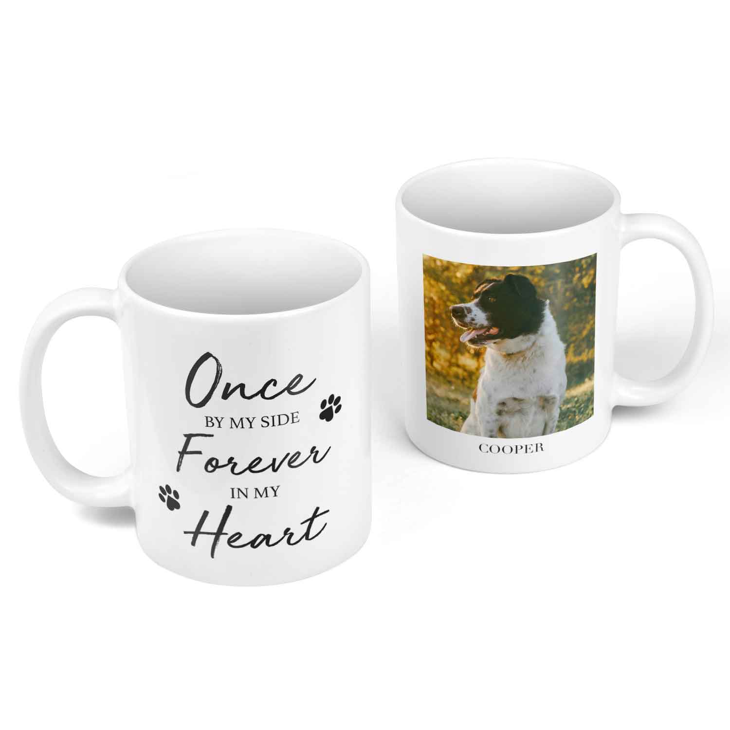 Two white mugs, one with a dog photo and name, the other with text 'Once by my side Forever in my Heart'.