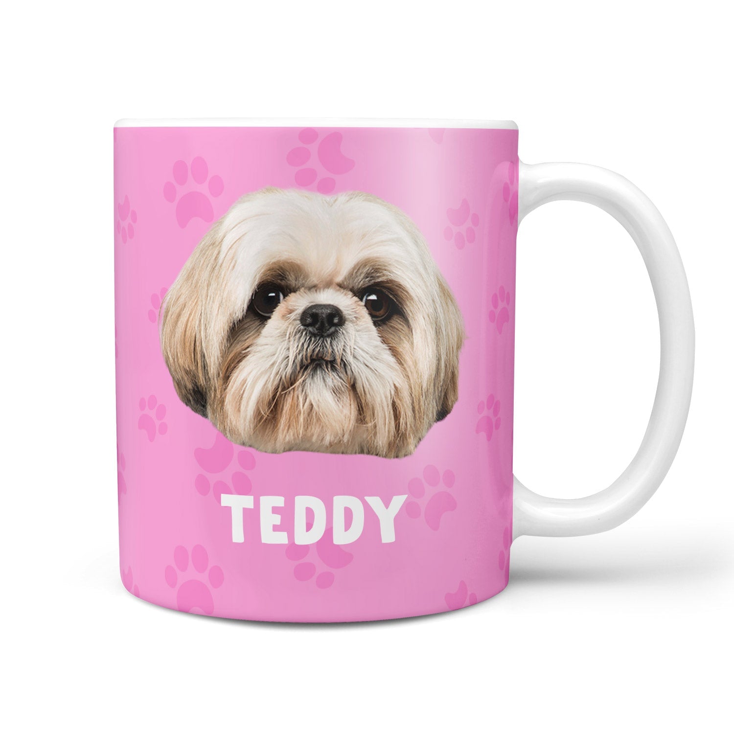 Pink mug with a dog's face and name 'Teddy' on a pink paw print pattern