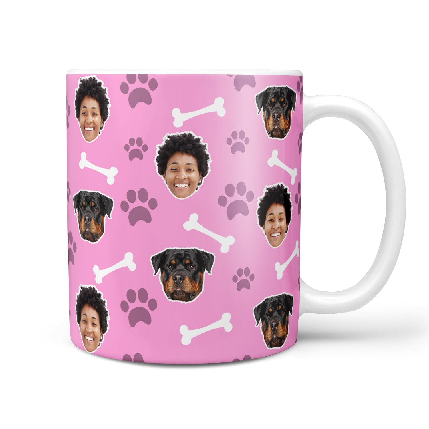 Pink mug with dog and paw pattern on a white background